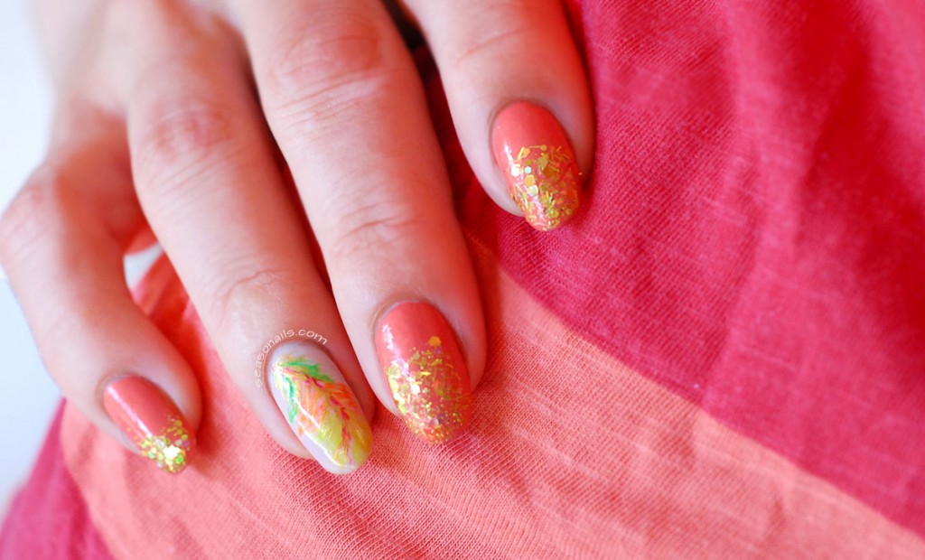 glitter gradient peach nails feather accent